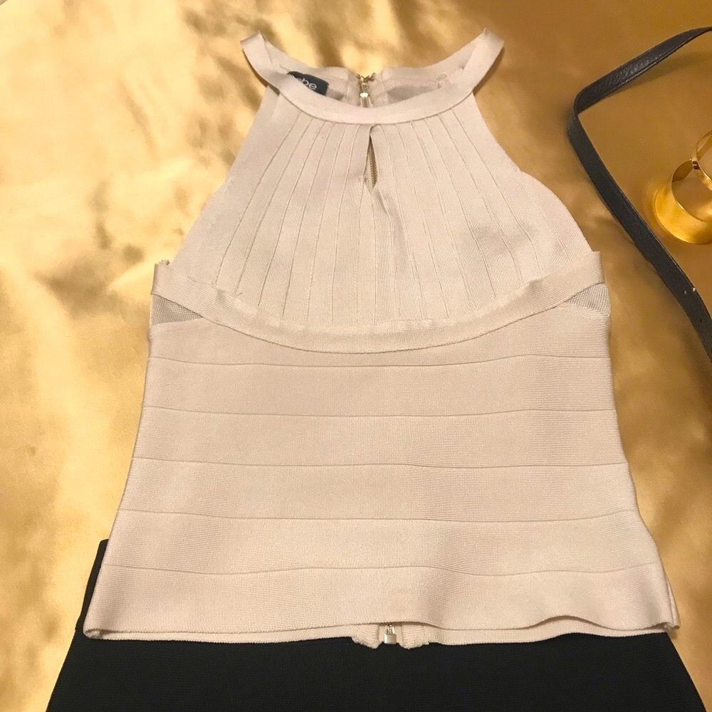 BEBE Bandage Halter Top. Key Hole opening with Sheer Mesh Panel on Back. Medium